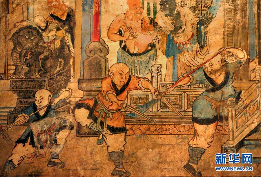 少林寺白衣殿內(nèi)的墻上表現(xiàn)少林武僧習(xí)武練拳的壁畫(局部,2005年9月15日攝)。