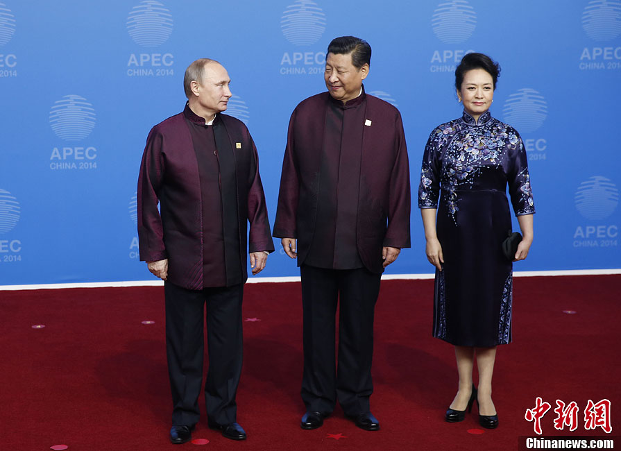 圖為習(xí)近平夫婦歡迎俄羅斯總統(tǒng)普京。中新社發(fā) 杜洋 攝