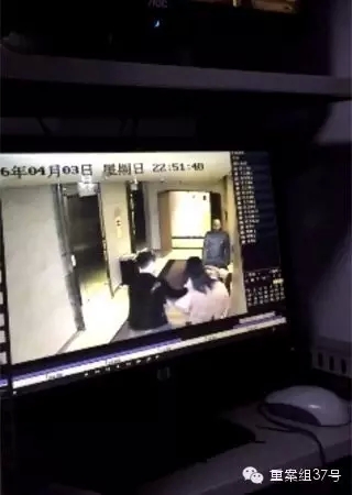一女子在酒店被陌生男子拖拽。    視頻截圖